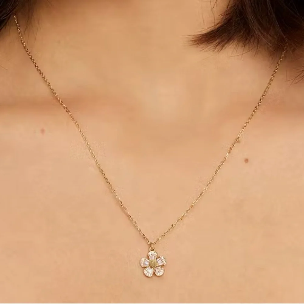 Kate Spade fleurette gold necklace.